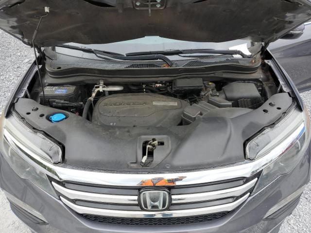 Photo 11 from auction – 2017 HONDA PILOT TOUR with VIN 5FNYF5H93HB001173