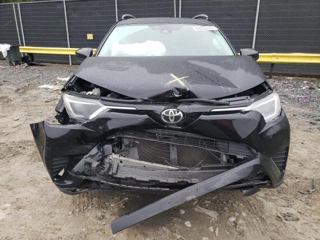 Photo 5 from auction – 2018 TOYOTA RAV4 LE with VIN 2T3ZFREV1JW458965