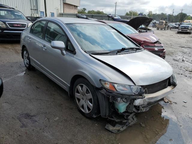 Photo 4 from auction – 2011 HONDA CIVIC LX with VIN 19XFA1F59BE040989