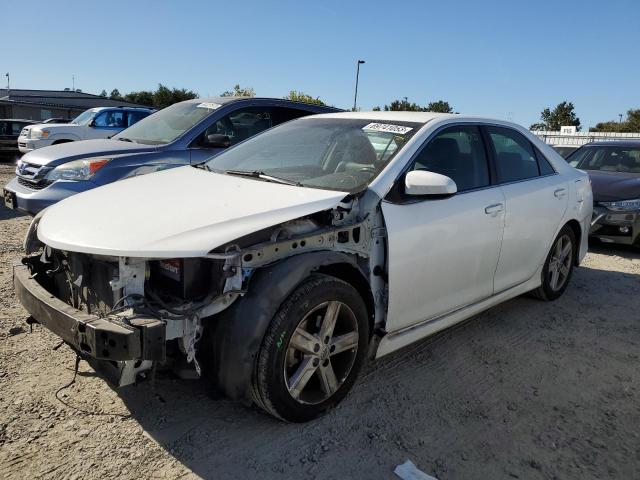 TOYOTA CAMRY L 2014 with VIN 4T1BF1FK9EU785670 - Photo from auction