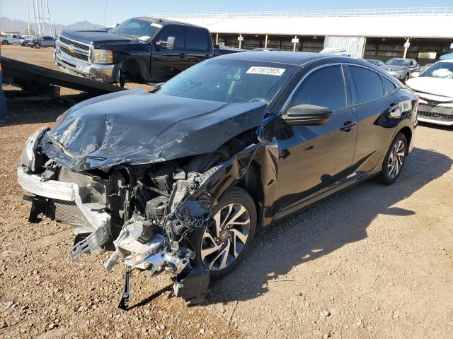 HONDA CIVIC EX 2017 with VIN 2HGFC2F74HH501063 - Photo from auction