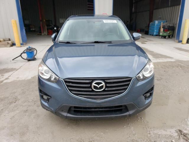 Photo 5 from auction – 2016 MAZDA CX-5 GT with VIN JM3KE4DY6G0797938