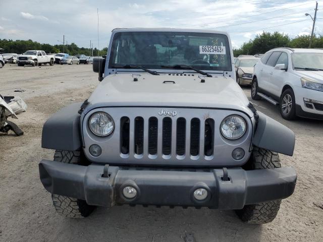 Photo 5 from auction – 2016 JEEP WRANGLER U with VIN 1C4BJWDG3GL103938