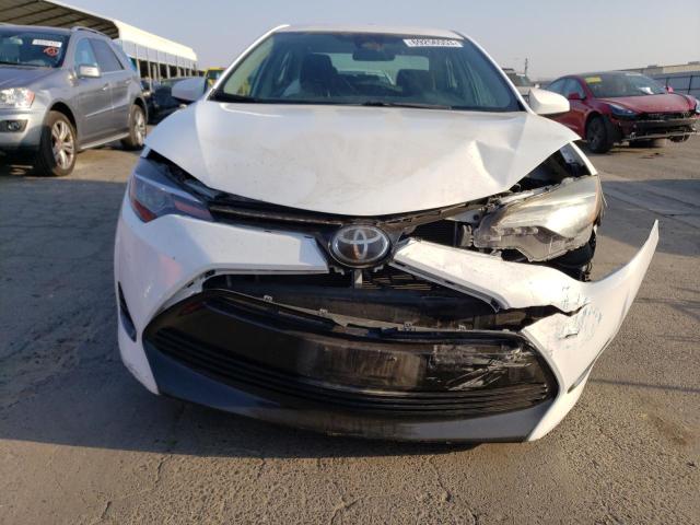 Photo 5 from auction – 2018 TOYOTA COROLLA L with VIN 2T1BURHE1JC057705