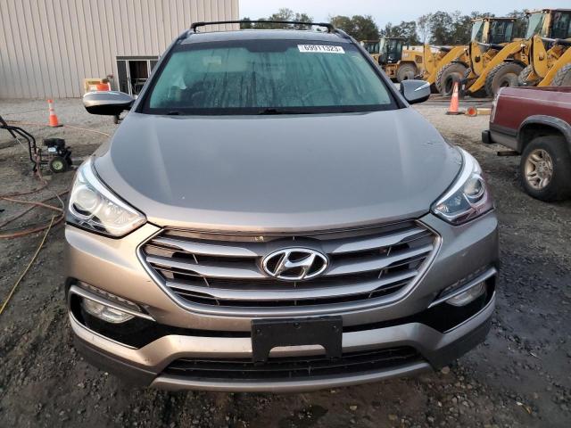 Photo 5 from auction – 2018 HYUNDAI SANTA FE S with VIN 5NMZU3LB8JH063827