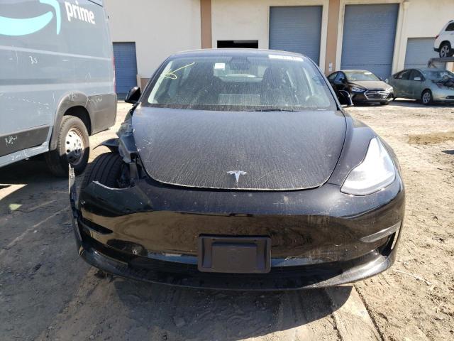Photo 5 from auction – 2022 TESLA MODEL 3 with VIN 5YJ3E1EB6NF294737