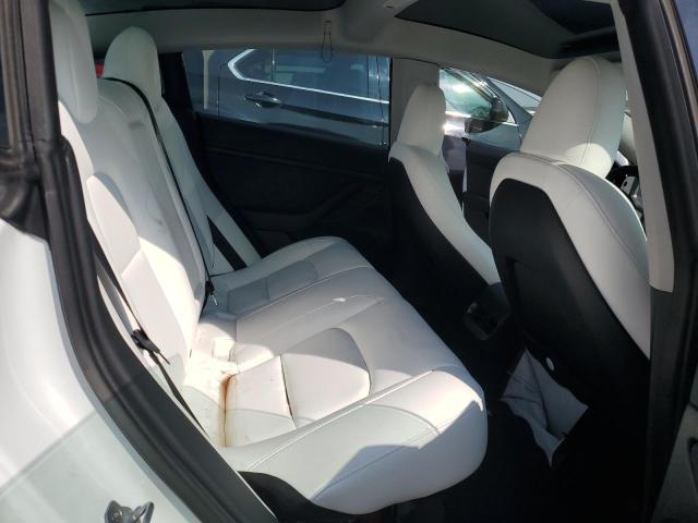 Photo 10 from auction – 2023 TESLA MODEL 3 with VIN 5YJ3E1ECXPF557520