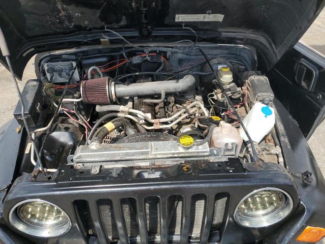 Фото 12 с аукциона – 2000 JEEP WRANGLER / с VIN 1J4FA59S0YP781205