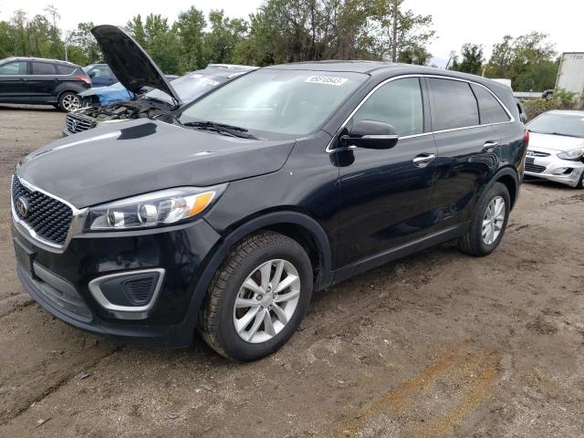KIA SORENTO LX 2016 with VIN 5XYPG4A37GG164604 - Photo from auction