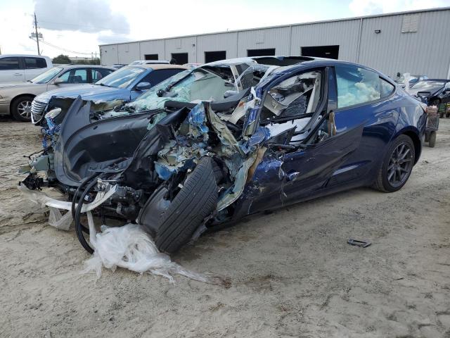TESLA MODEL 3 2023 with VIN 5YJ3E1EA4PF447593 - Photo from auction