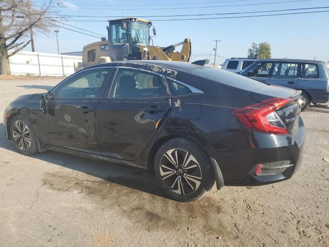 Photo 2 from auction – 2018 HONDA CIVIC EX with VIN JHMFC1F33JX010764