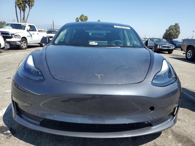 Снимка 5 от търг – 2022 TESLA MODEL 3 с VIN 5YJ3E1ECXNF298802