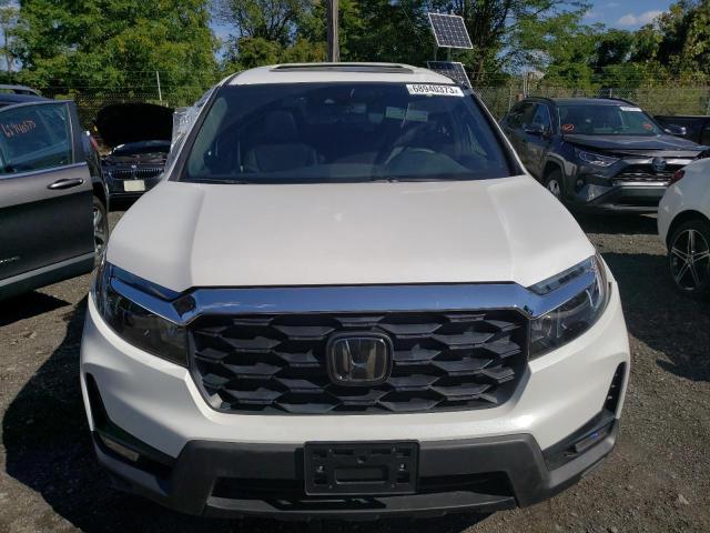 Photo 5 from auction – 2023 HONDA PASSPORT E with VIN 5FNYF8H54PB018173