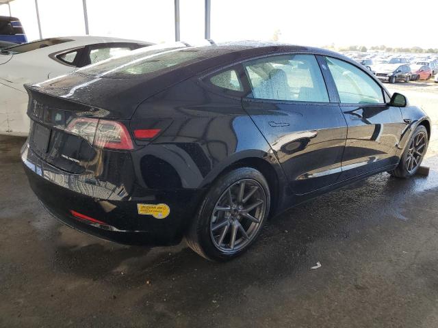 Photo 3 from auction – 2022 TESLA MODEL 3 with VIN 5YJ3E1EBXNF299035