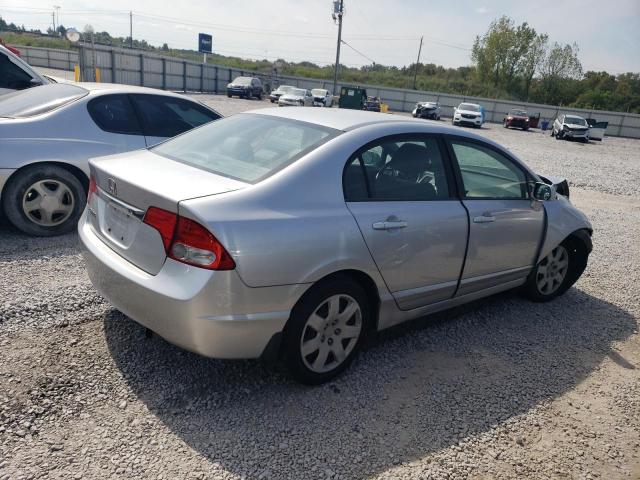 Photo 3 from auction – 2011 HONDA CIVIC LX with VIN 19XFA1F5XBE042556