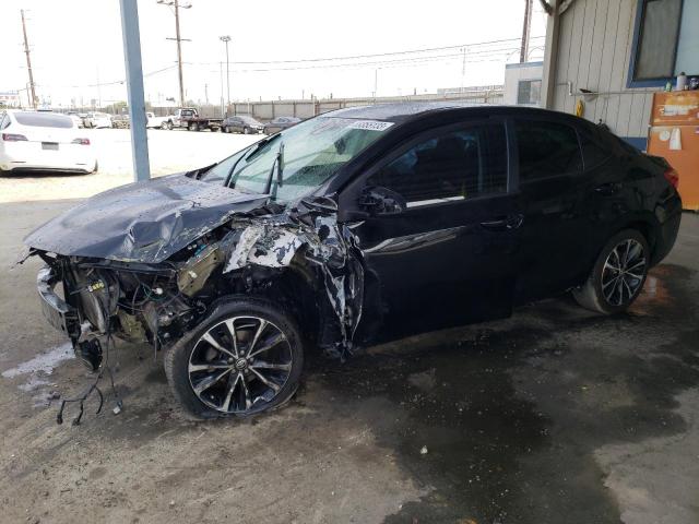 TOYOTA COROLLA L 2018 with VIN 5YFBURHEXJP829893 - Photo from auction