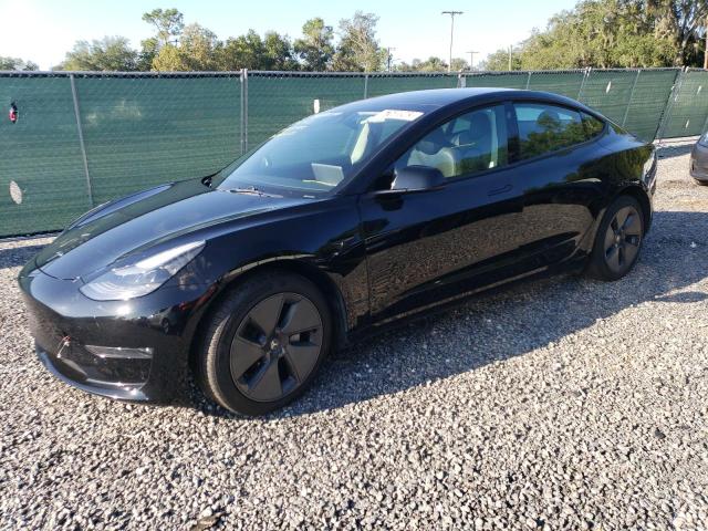 TESLA MODEL 3 2022 with VIN 5YJ3E1EB8NF290656 - Photo from auction