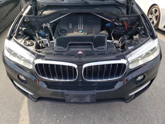 Photo 11 from auction – 2014 BMW X5 XDRIVE3 with VIN 5UXKS4C58E0J93652