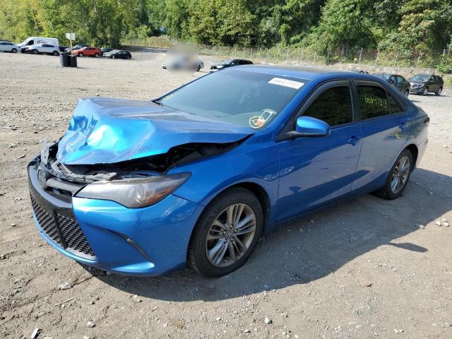 TOYOTA CAMRY LE 2017 with VIN 4T1BF1FKXHU811360 - Photo from auction
