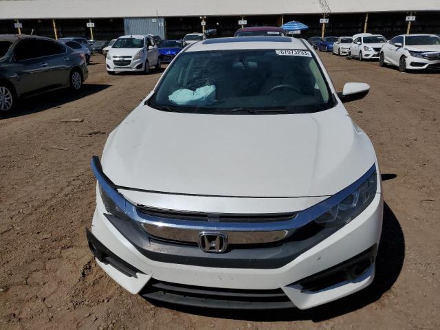 Photo 5 from auction – 2018 HONDA CIVIC EX with VIN 19XFC1E35JE001079