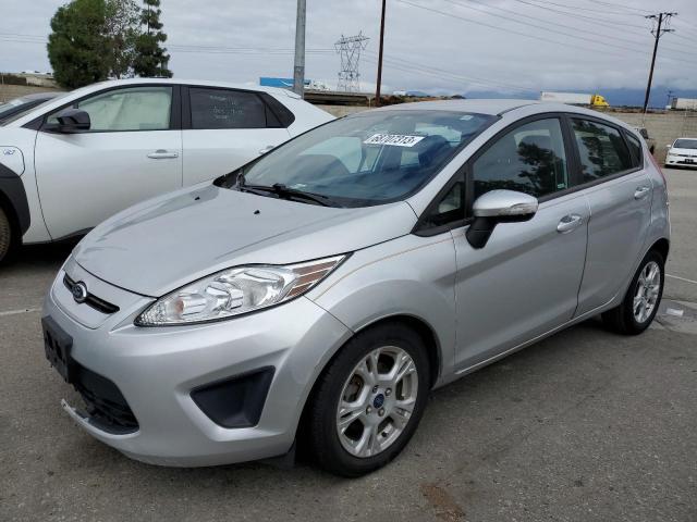 FORD FIESTA SE 2013 with VIN 3FADP4EJXDM158277 - Photo from auction