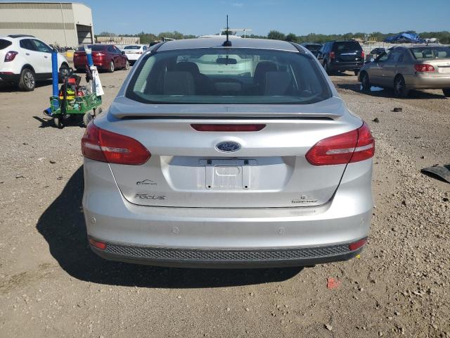 Photo 6 from auction – 2015 FORD FOCUS SE with VIN 1FADP3F20FL252657