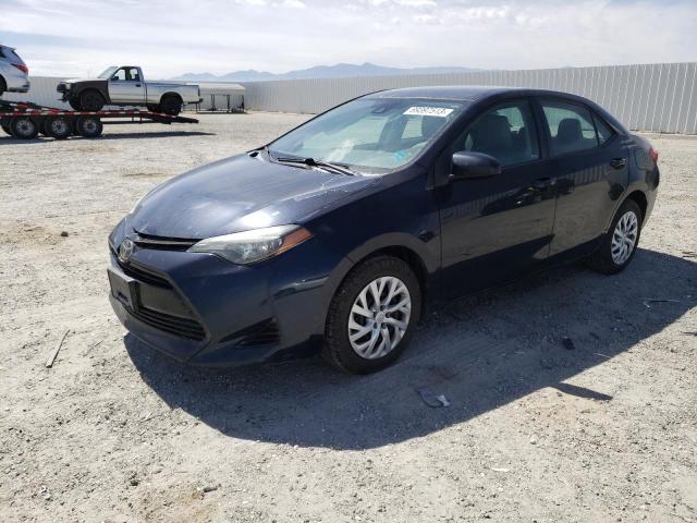 TOYOTA COROLLA L 2017 with VIN 5YFBURHE8HP713974 - Photo from auction