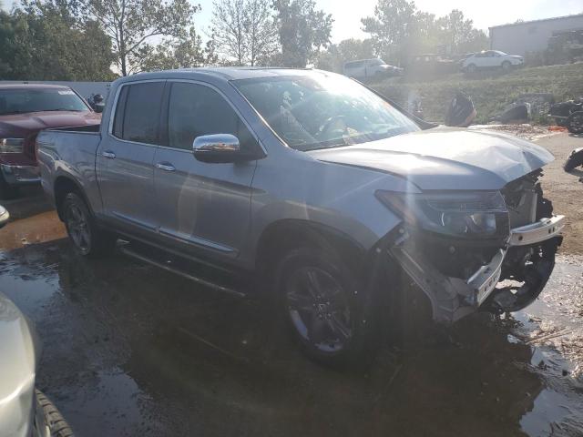 Photo 4 from auction – 2021 HONDA RIDGELINE with VIN 5FPYK3F79MB020359