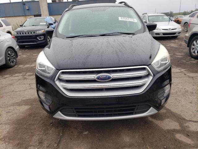 Photo 5 from auction – 2017 FORD ESCAPE SE with VIN 1FMCU9G99HUD30875