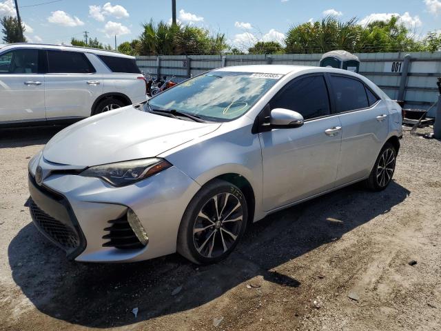 TOYOTA COROLLA L 2018 with VIN 5YFBURHE9JP843848 - Photo from auction