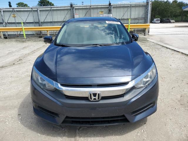 Photo 5 from auction – 2018 HONDA CIVIC EX with VIN 19XFC2F71JE030778