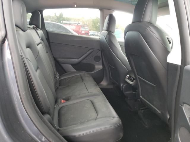 Photo 10 from auction – 2023 TESLA MODEL Y with VIN 7SAYGDEFXPF601028