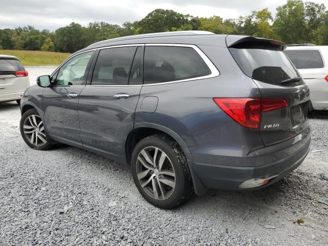 Photo 2 from auction – 2017 HONDA PILOT TOUR with VIN 5FNYF5H93HB001173