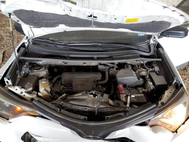 Photo 12 from auction – 2018 TOYOTA RAV4 LE with VIN JTMZFREV0JJ197018