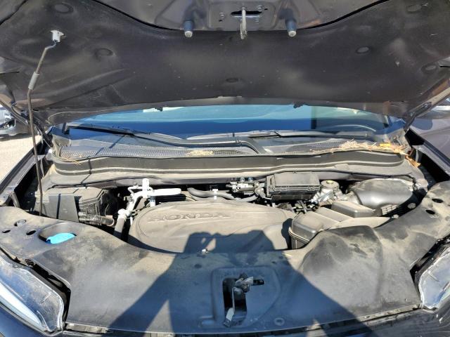 Photo 12 from auction – 2021 HONDA PASSPORT E with VIN 5FNYF7H55MB012632