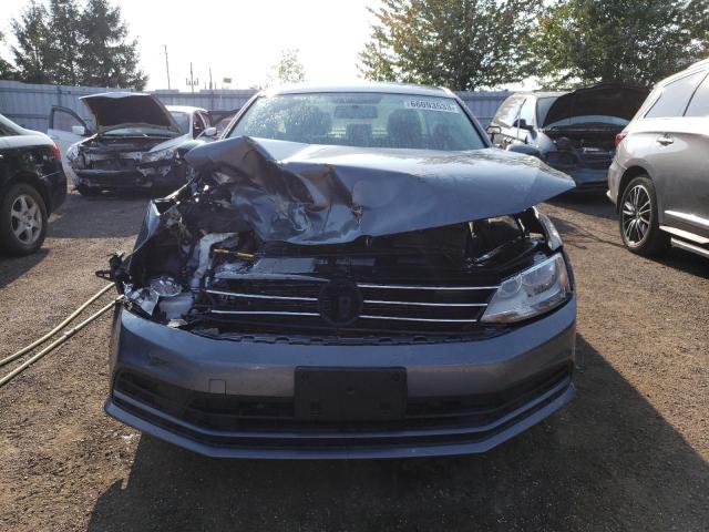 Photo 5 from auction – 2017 VOLKSWAGEN JETTA S with VIN 3VW2B7AJ0HM238648
