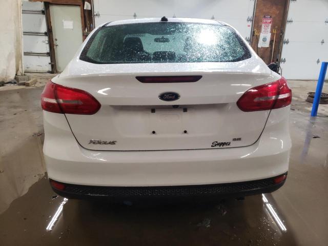 Photo 6 from auction – 2015 FORD FOCUS SE with VIN 1FADP3F28FL312832