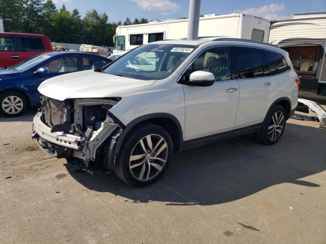 HONDA PILOT TOUR 2016 with VIN 5FNYF6H95GB012289 - Photo from auction