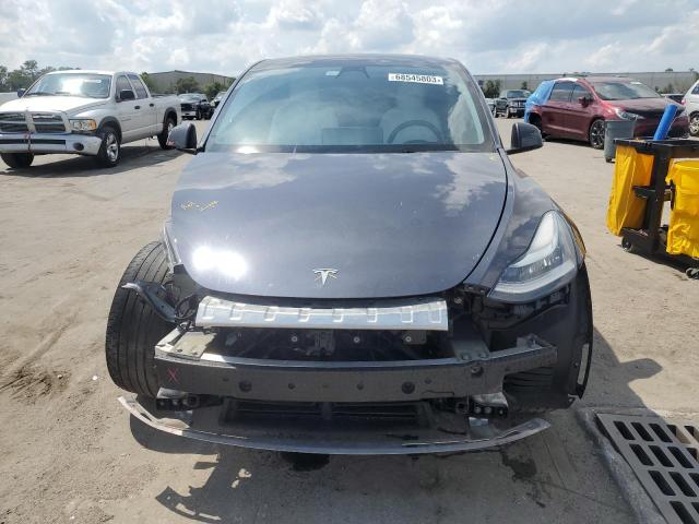 Photo 5 from auction – 2021 TESLA MODEL Y with VIN 5YJYGDEE3MF246851