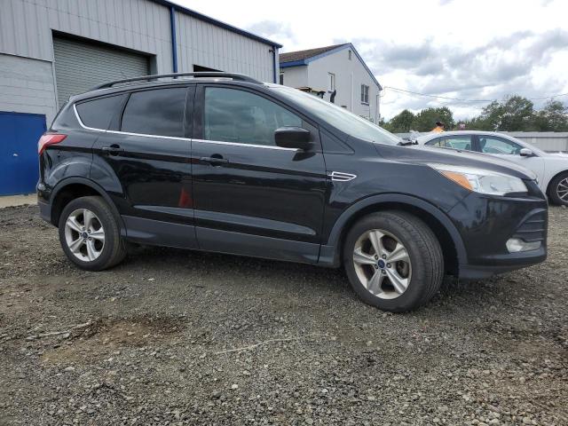 Photo 4 from auction – 2016 FORD ESCAPE SE with VIN 1FMCU9GX0GUC18480