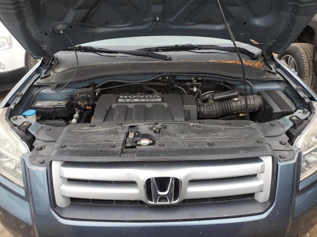 Photo 12 from auction – 2006 HONDA PILOT LX with VIN 2HKYF18136H540006