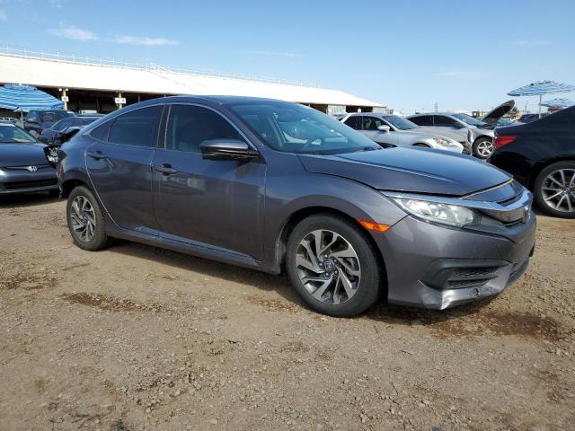 Photo 4 from auction – 2018 HONDA CIVIC EX with VIN 19XFC2F77JE015444