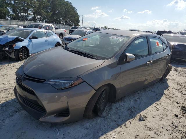 TOYOTA COROLLA L 2019 with VIN 5YFBURHE4KP860980 - Photo from auction