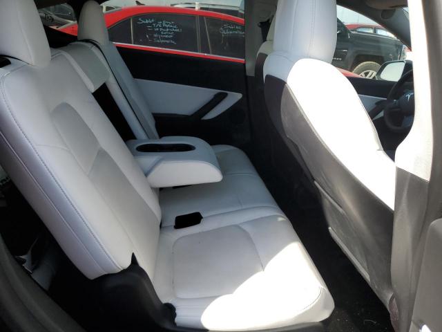Photo 11 from auction – 2021 TESLA MODEL Y with VIN 5YJYGAEE4MF301208