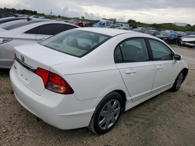 Photo 3 from auction – 2011 HONDA CIVIC LX with VIN 19XFA1F50BE031887
