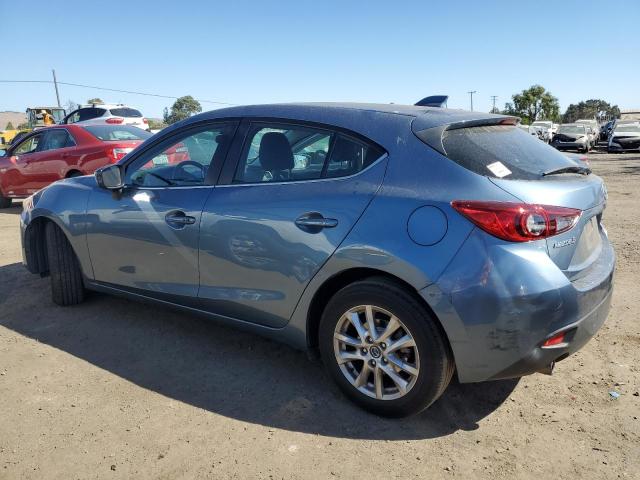 Photo 2 from auction – 2014 MAZDA 3 TOURING with VIN JM1BM1L79E1160956