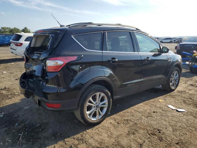 Photo 3 from auction – 2018 FORD ESCAPE SE with VIN 1FMCU9GD8JUC84272