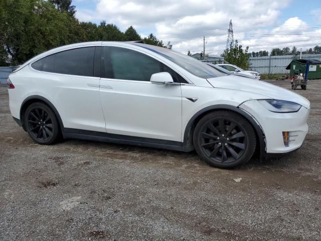 Снимка 4 от търг – 2020 TESLA MODEL X с VIN 5YJXCAE21LF233266