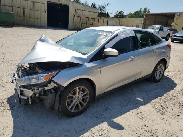FORD FOCUS SE 2018 with VIN 1FADP3F29JL245487 - Photo from auction