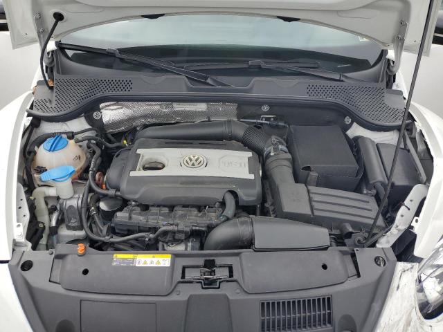 Photo 11 from auction – 2012 VOLKSWAGEN BEETLE TUR with VIN 3VWVA7ATXCM618932